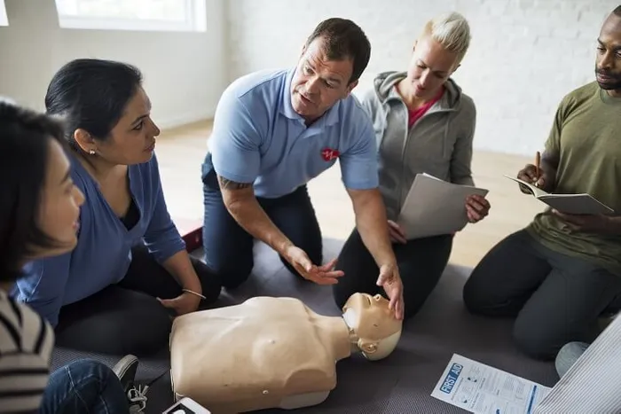 People Learning First Aid